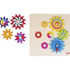 Bébé ingénieur avec le jouet puzzle engrenage en bois :